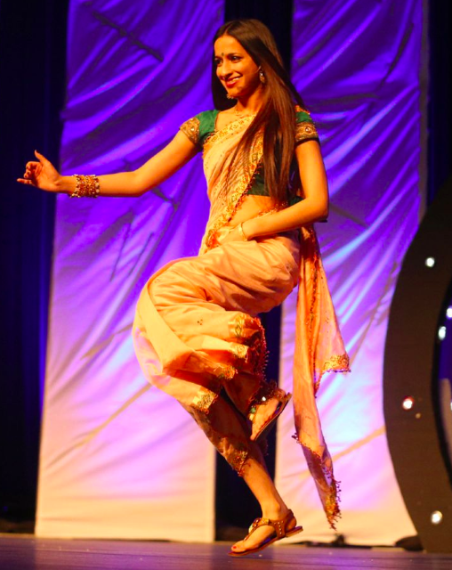 Yalini Rajakulasingam dances on stage at Thaalam 2014. 