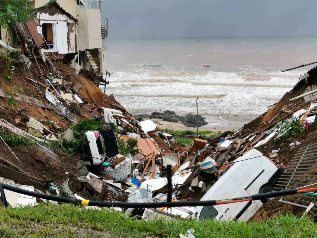 Buildings and cars caved in and requiring emergency excavation to rescue those trapped